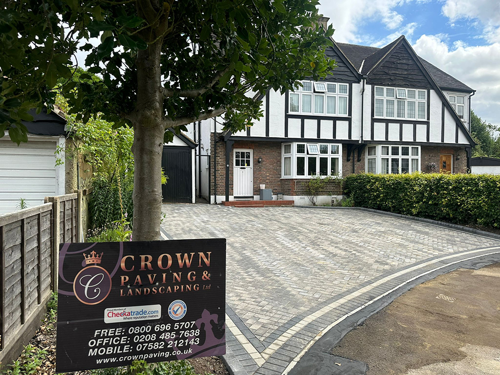 Dark block paving with contrast border completed in Leatherhead Dark block paving with contrast border completed in Leatherhead